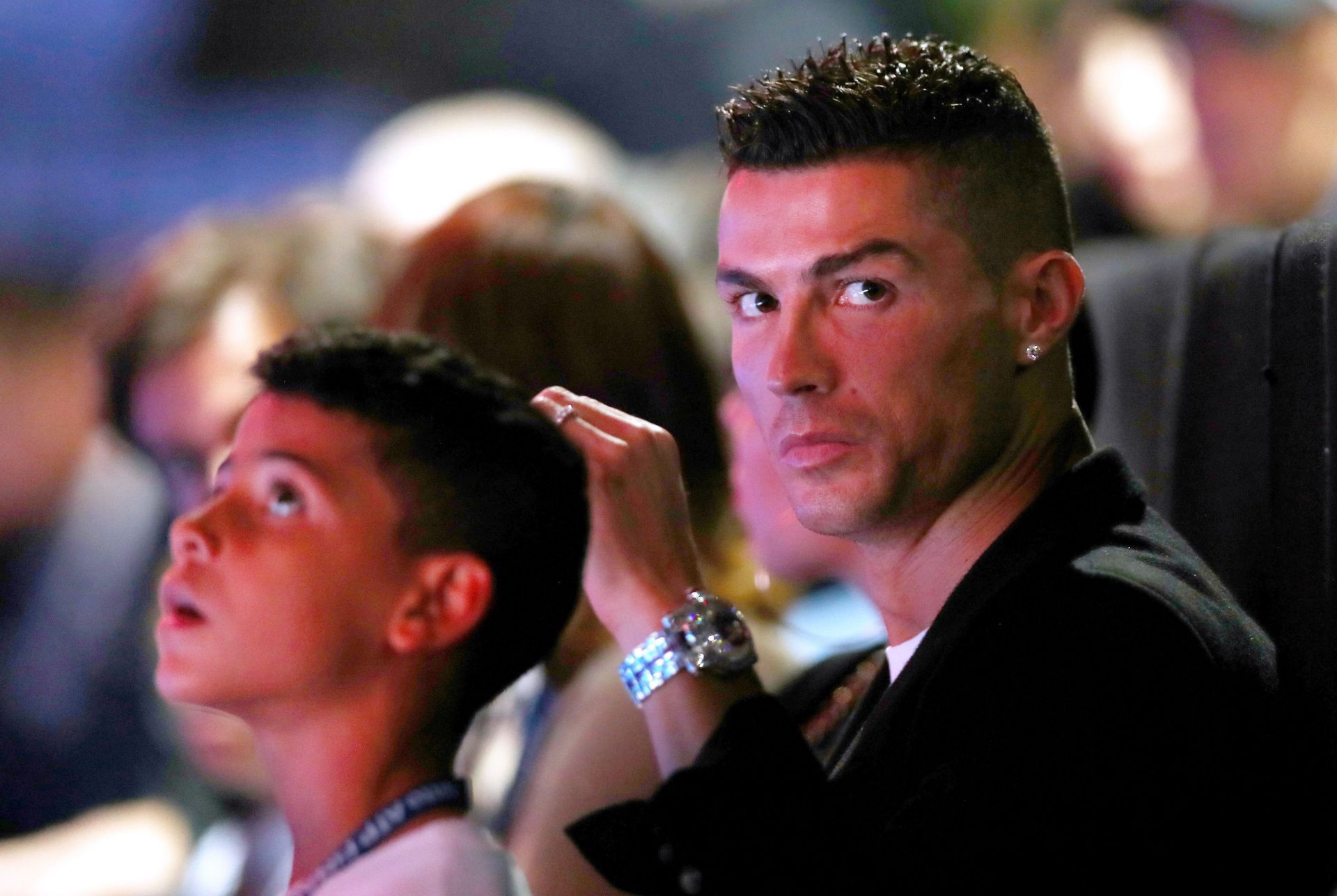 Cristiano Ronaldo watching Novak Djokovic in action