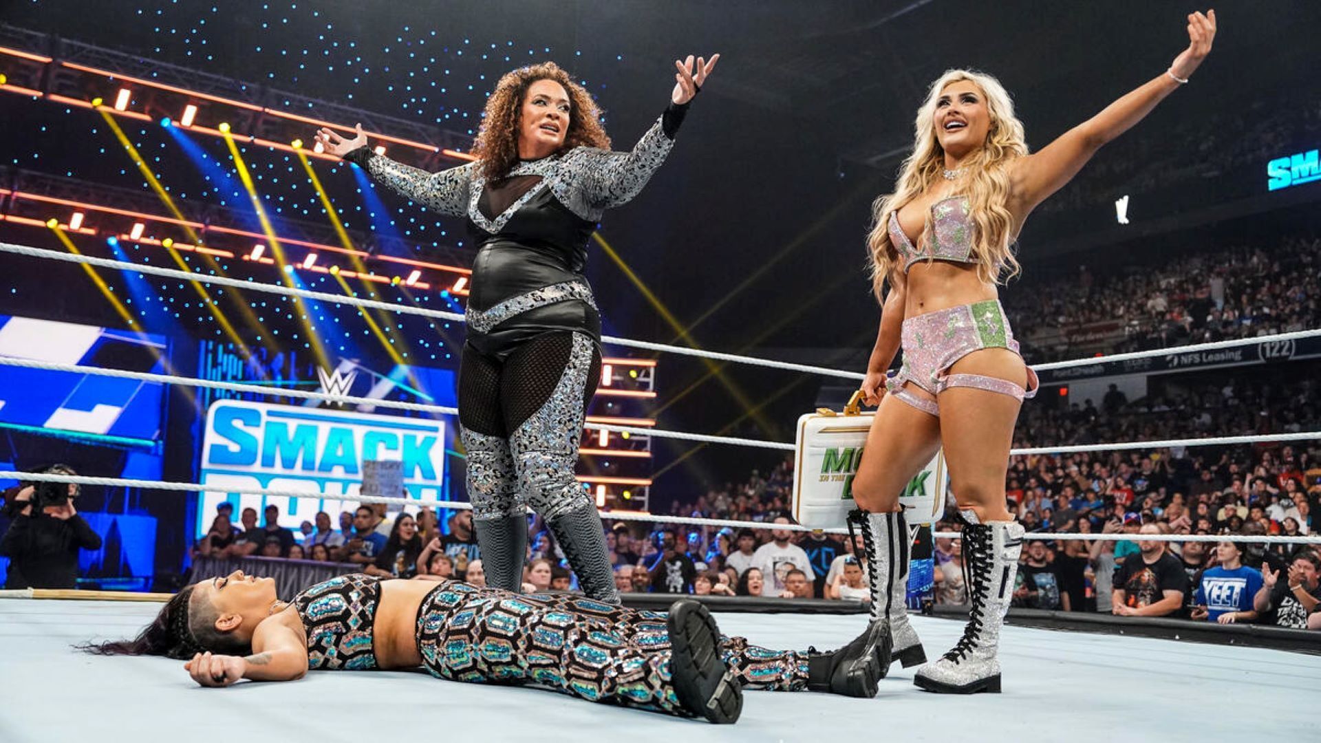 Can Bayley overcome the newly formed alliance between Nia Jax and Tiffany Stratton? {Image Credit: WWE.com}