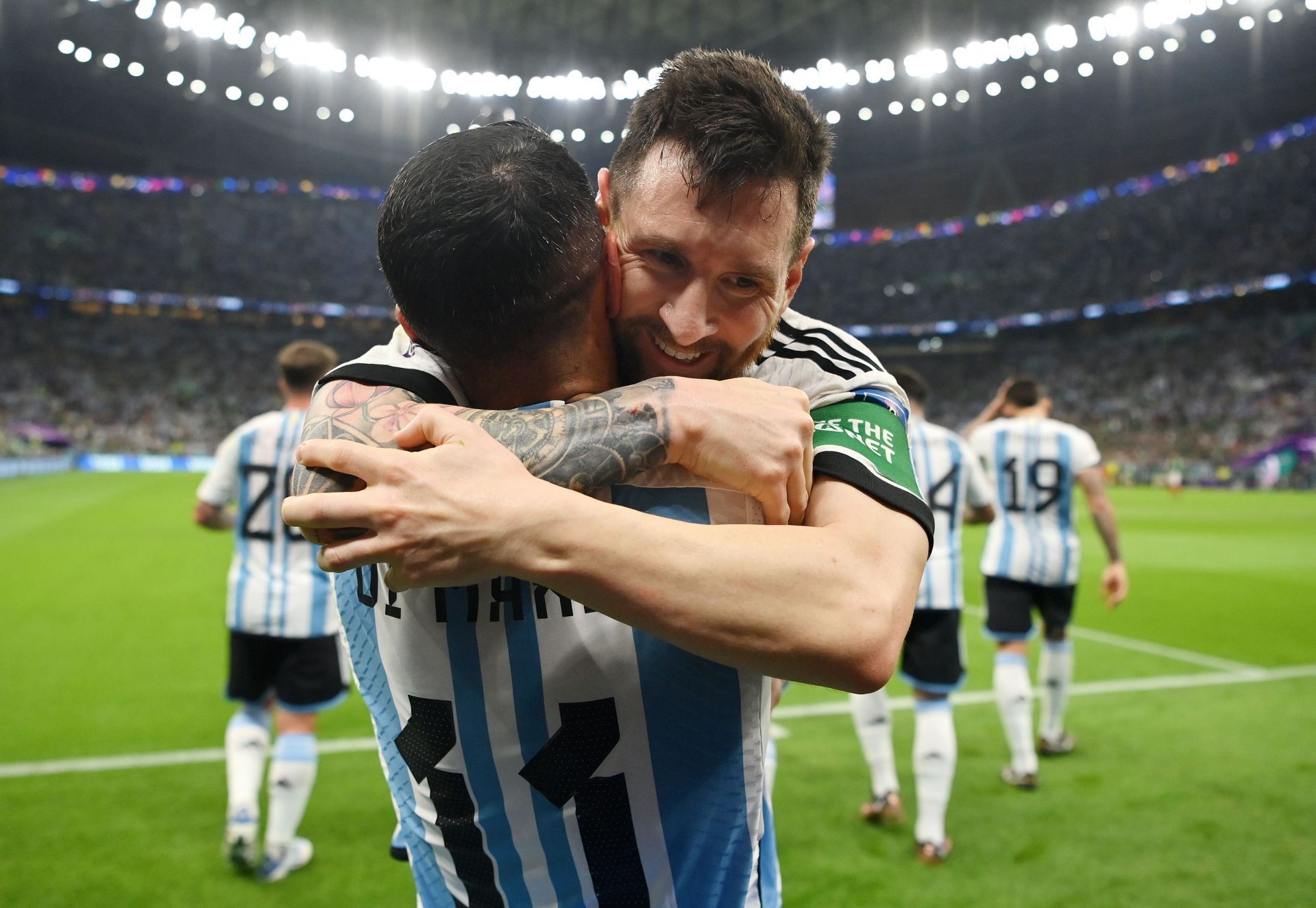 Angel Di Maria hugging Lionel Messi