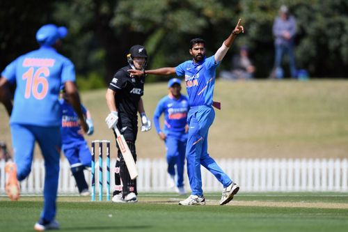 Sandeep Warrier celebrates picking a wicket for India A.