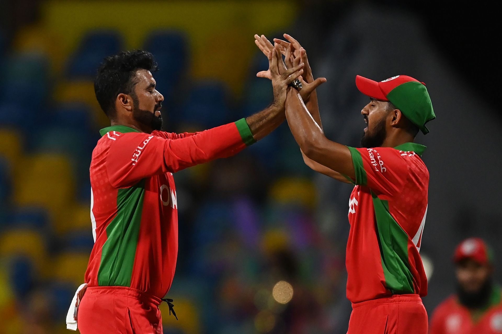 Bilal Khan (left) celebrates a wicket with a teammate. (Image Credits: Getty Images)