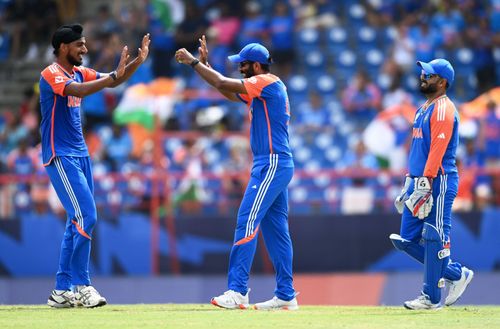 Arshdeep Singh and Jasprit Bumrah celebrate. (Credits: Getty)