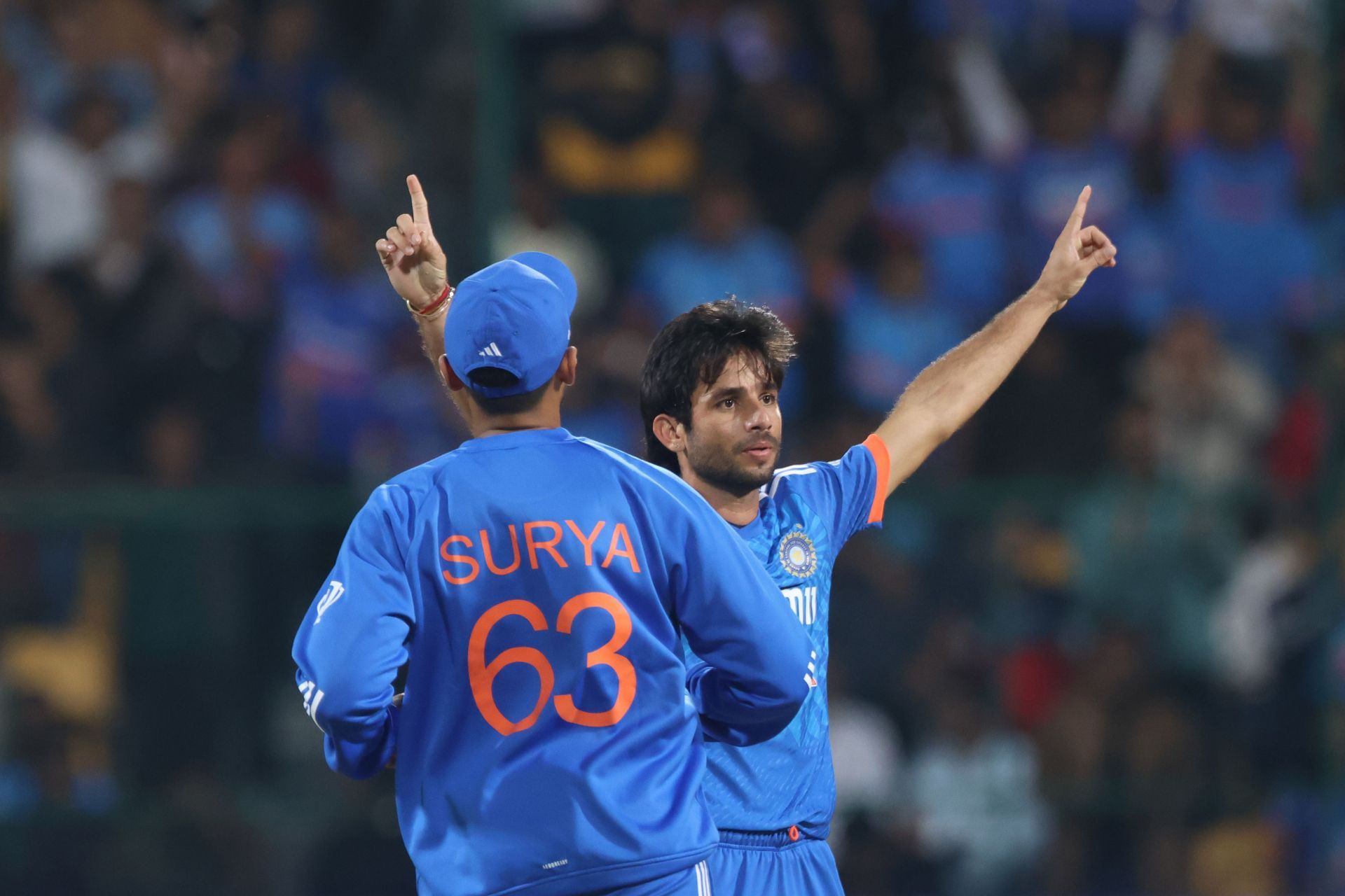 Ravi Bishnoi of India celebrates the wicket of Aron Hardie of Australia during game five of the T20 International series between India and Australia at M. Chinnaswamy Stadium on December 3, 2023, in Bangalore, India.