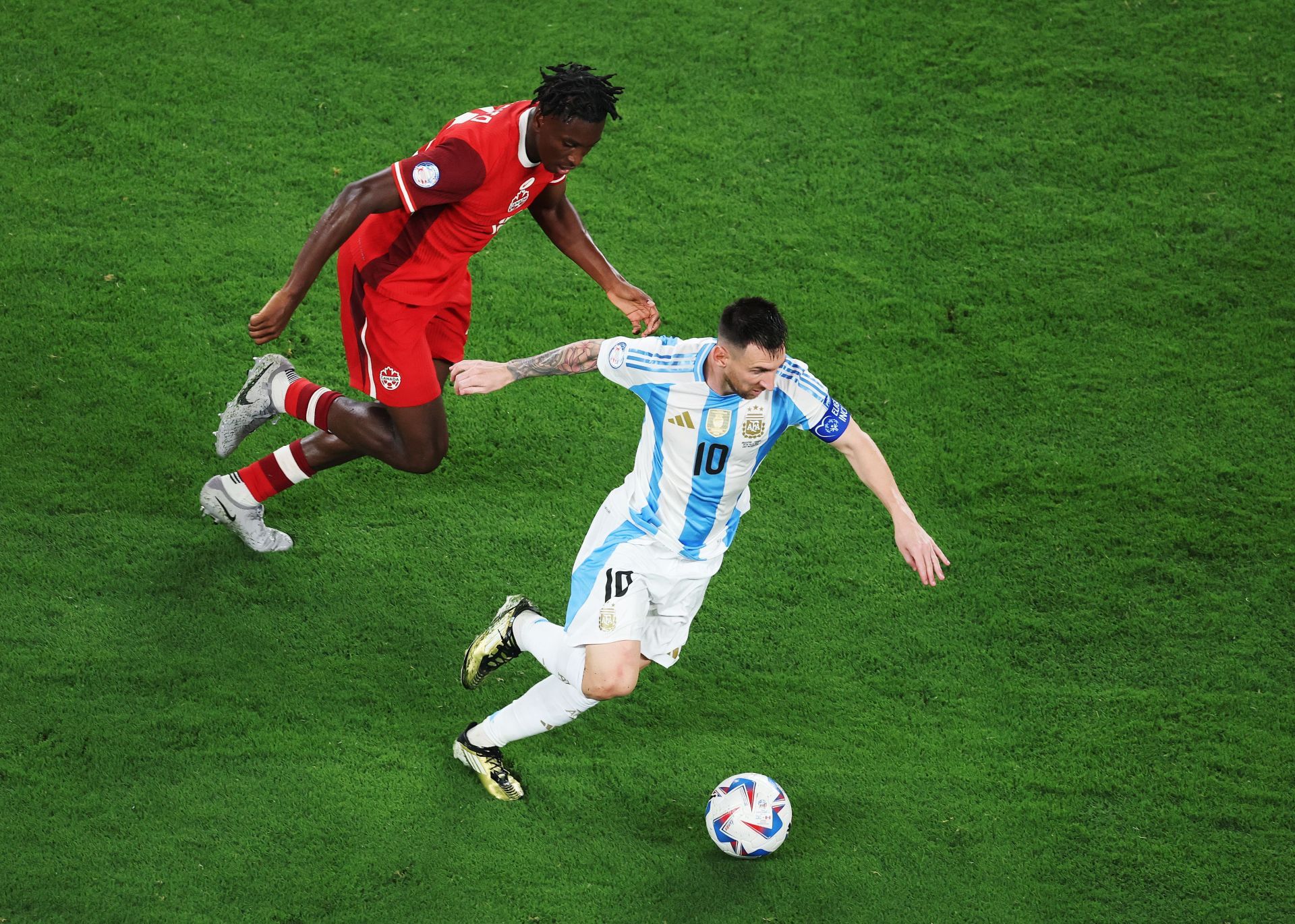 Lionel Messi in action vs Canada (Photo by Al Bello/Getty Images)