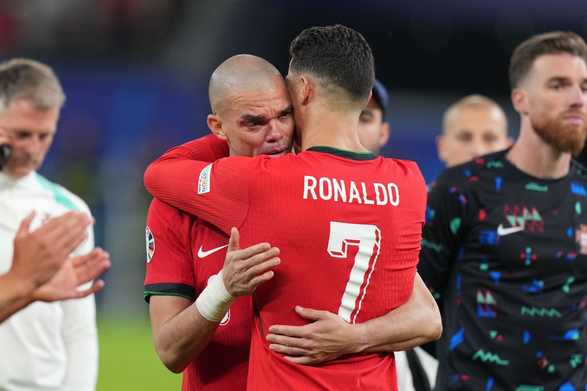 Pepe (facing) and Cristiano Ronaldo