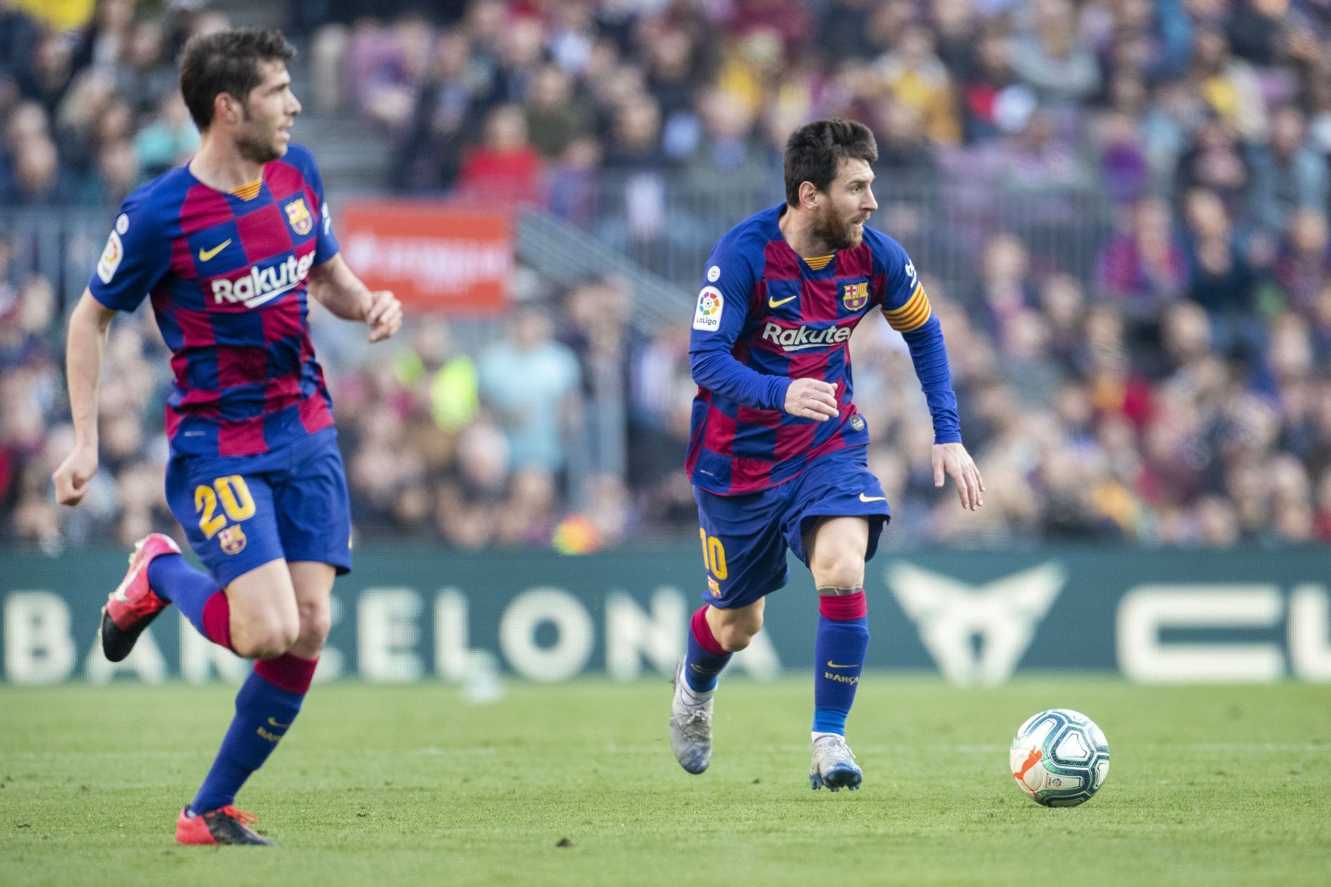 Sergi Roberto (left) and Lionel Messi