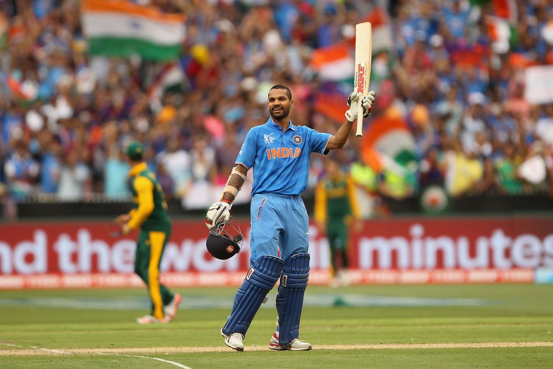 The former India opener celebrates his hundred against the Proteas in the 2015 World Cup. (Image Credits: Getty Images)