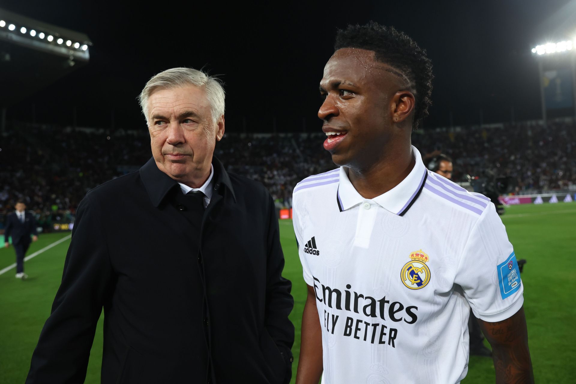 Real Madrid boss Carlo Ancelotti (left) and Vinicius