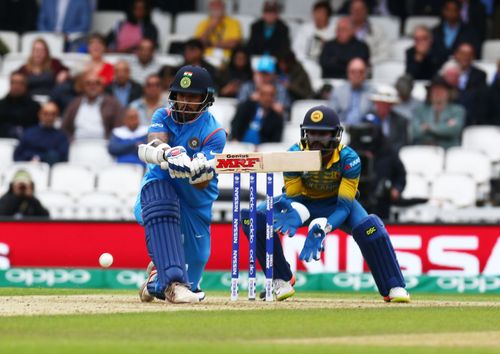 The retired Indian opener sweeps a ball during the 2017 Champions Trophy match against Sri Lanka. (Image Credits: Getty Images)