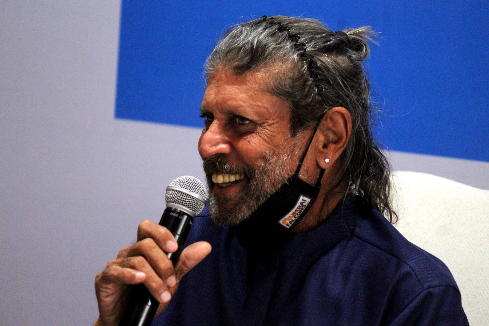 Former India captain Kapil Dev speaking at a press conference.