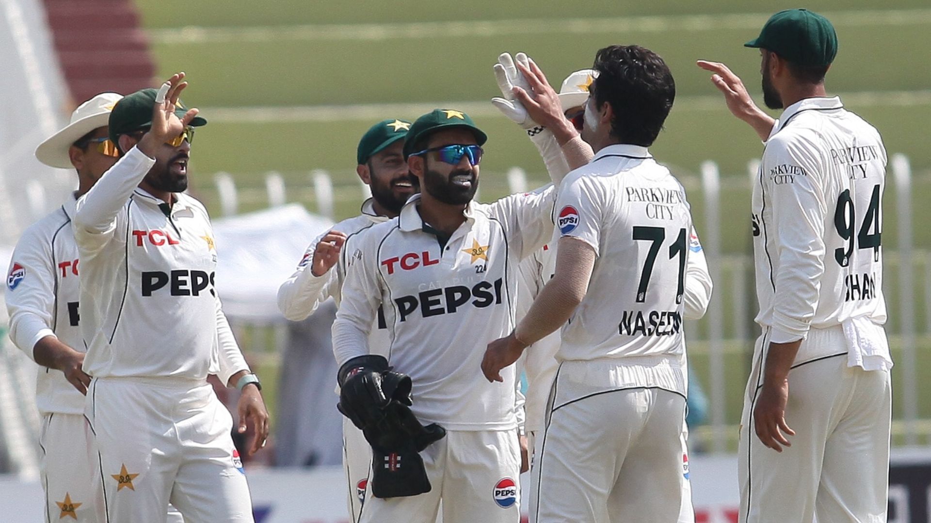 Pakistan&#039;s fielders gather around to celebrate the wicket of Zakir Hasan on Day 3 of PAK vs BAN 2024 1st Test (Image credits: @TheRealPCB on X)