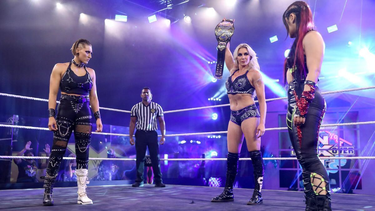 Charlotte Flair vs. Rhea Ripley vs. Io Shirai -- NXT Women&#039;s Title Triple  Threat Match: photos | WWE