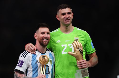 Lionel Messi (left) and Emiliano Martinez