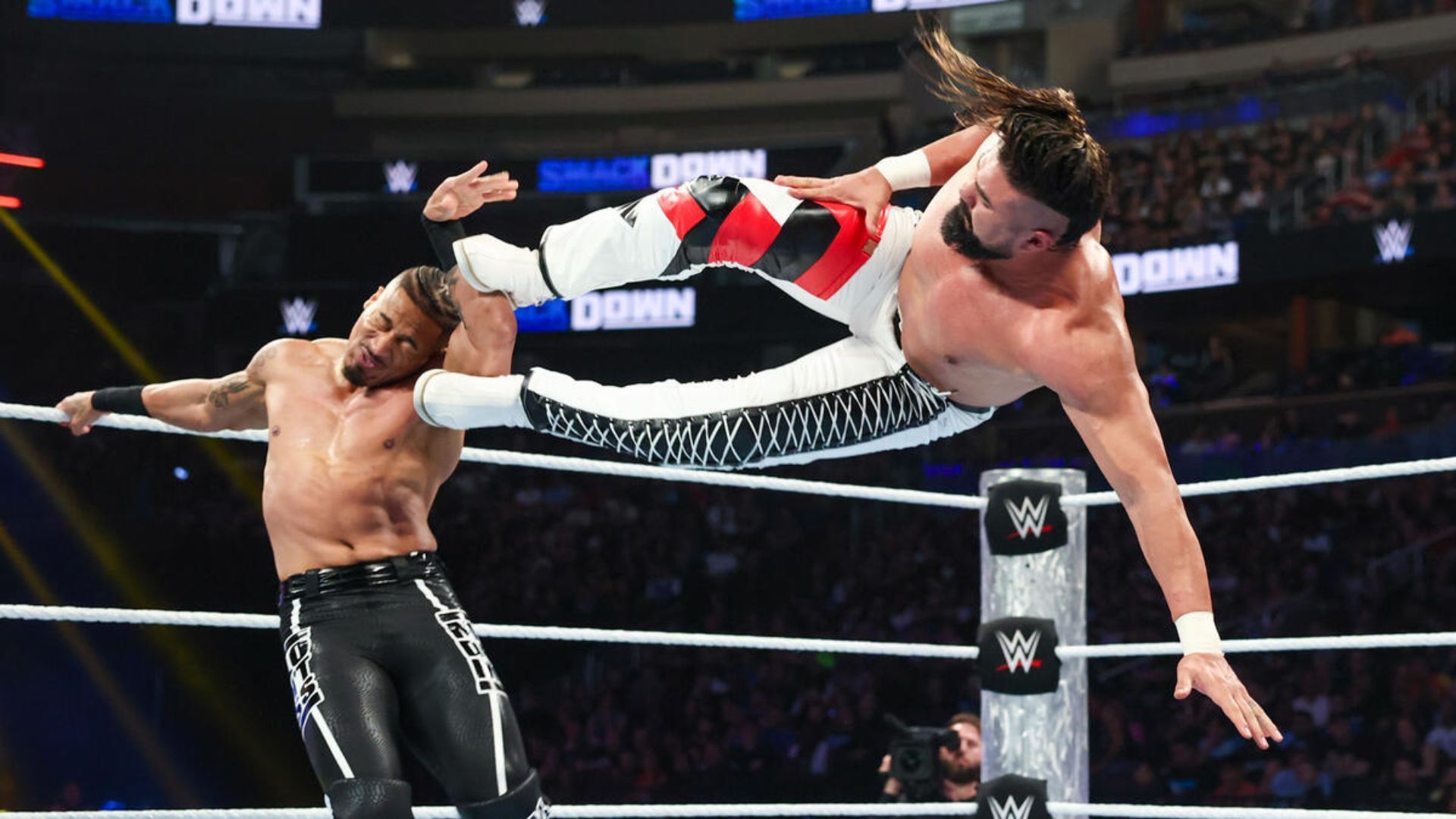 Andrade and Carmelo last month on SmackDown [Image Credits: WWE.com]