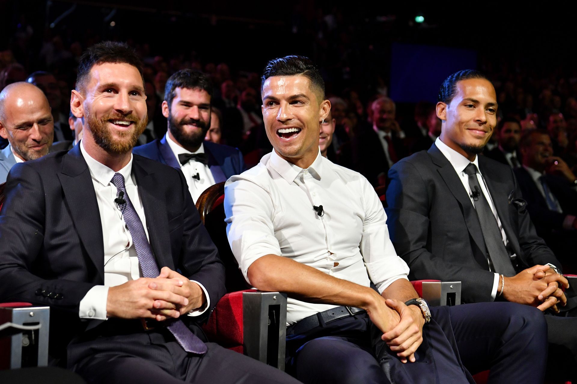 Lionel Messi (left and Cristiano Ronaldo (centre)