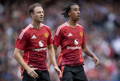 Leny Yoro (R) moved to Old Trafford this summer