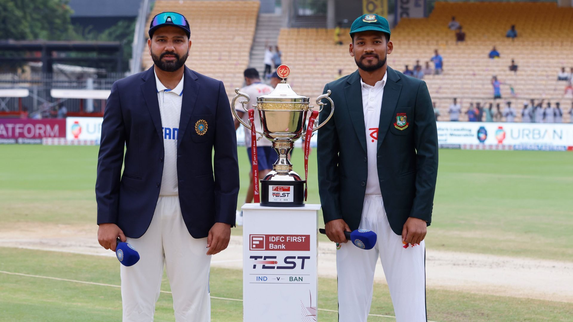 Rohit Sharma and Najmul Hossain Shanto pose with the trophy (Image credits: BCCI)