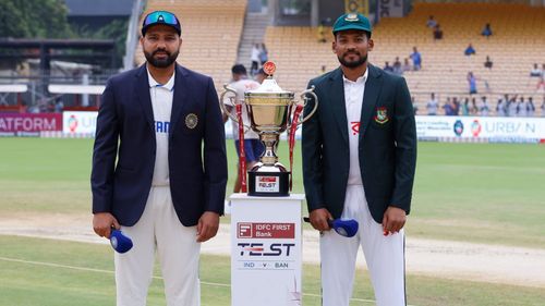 Rohit Sharma and Najmul Hossain Shanto pose with the trophy (Image credits: BCCI)