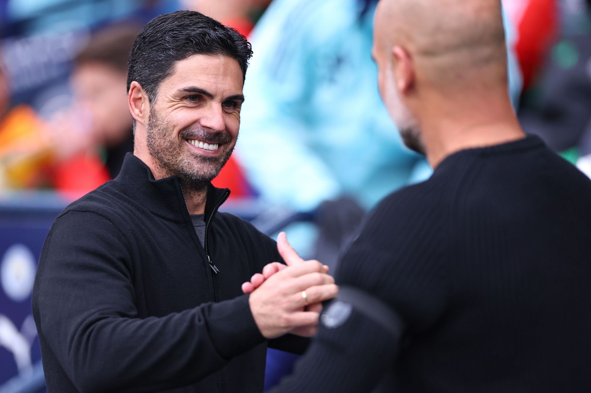 Mikel Arteta and Pep Guardiola