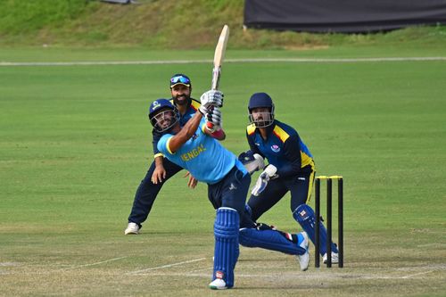 Bengal Batsman Manoj Tiwari plays a shot during Vijay Hazare Trophy match against Jammu & Kashmir at Jaipuriya Cricket Ground in Jaipur.