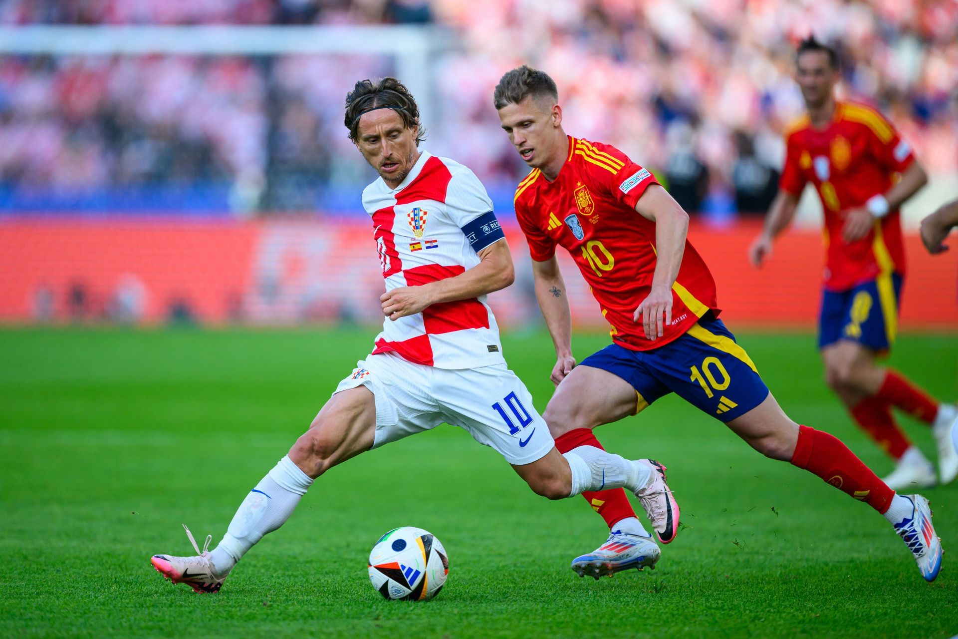 Real Madrid midfielder Luka Modric (left)