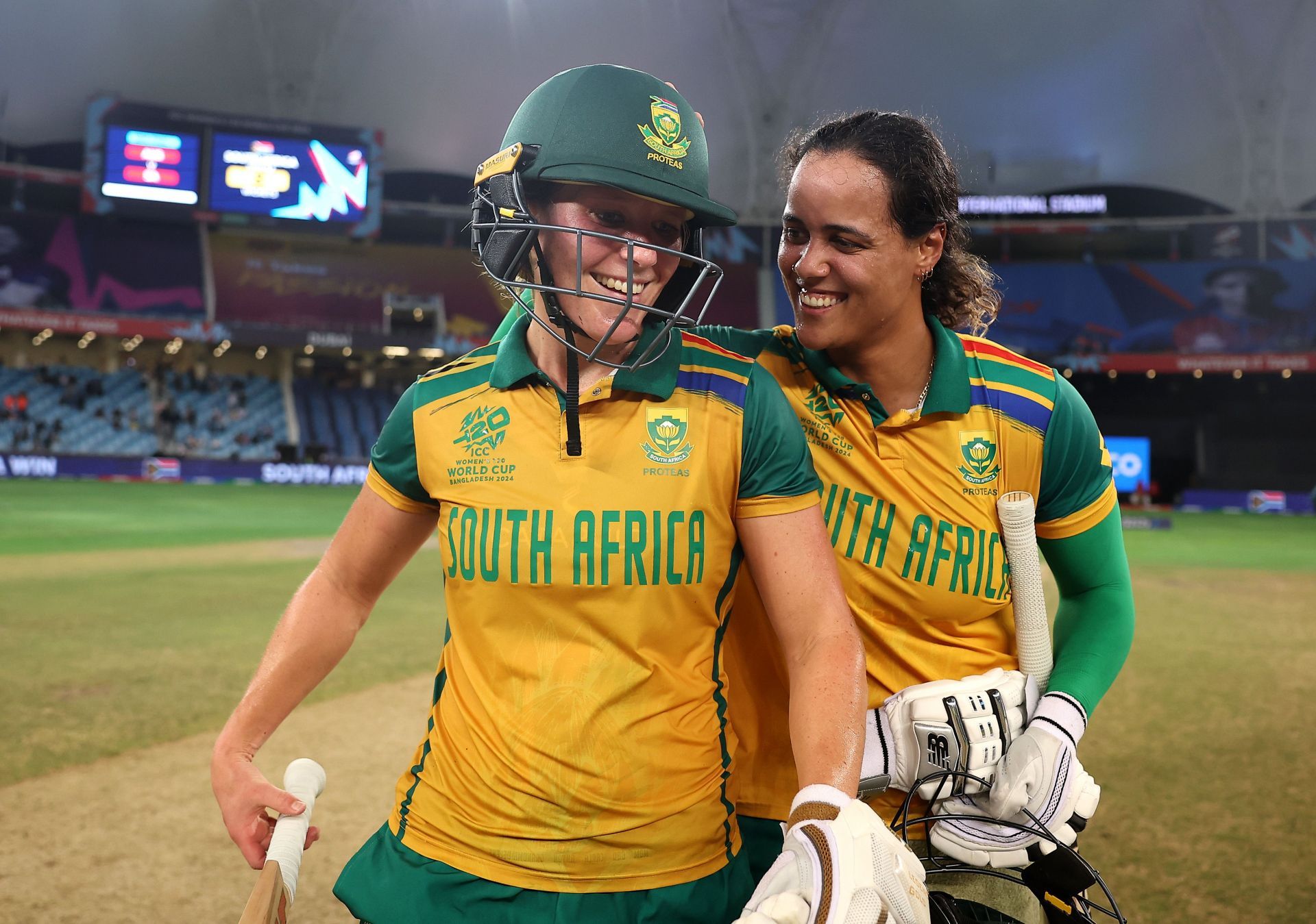 Anneke Bosch and Chloe Tryon celebrate after winning the semi-final against Australia. Source: Getty