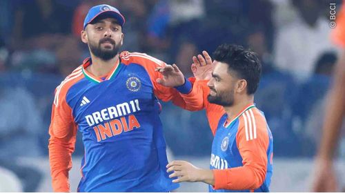 Varun Chakravarthy (L) and Rinku Singh (R) celebrate the wicket of Tanzid Hasan Tamim (Image credits: BCCI)