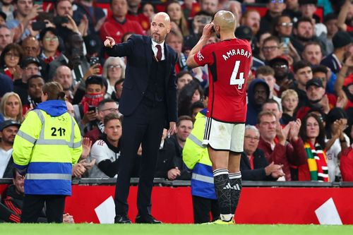 Erik ten Hag instructs Sofyan Amrabat from the touchline (Image - Getty)