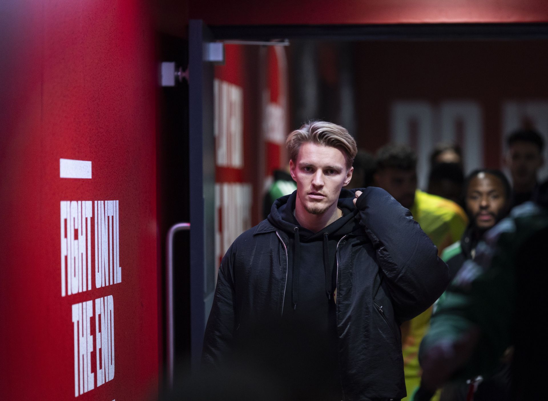 Martin Odegaard walks down the Emirates tunnel (Image - Getty)