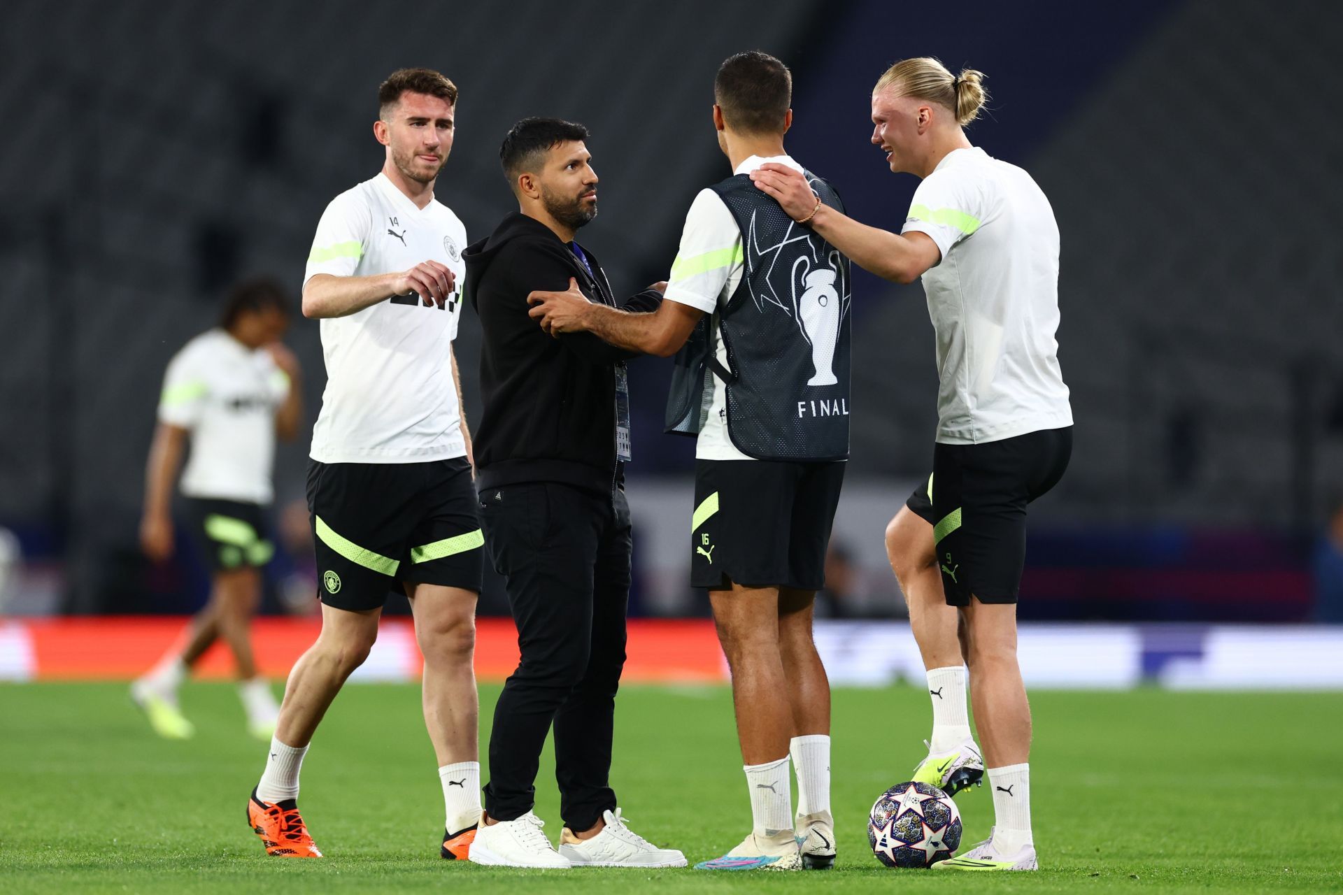 Rodri and Haaland talking to Kun Aguero - Source: Getty