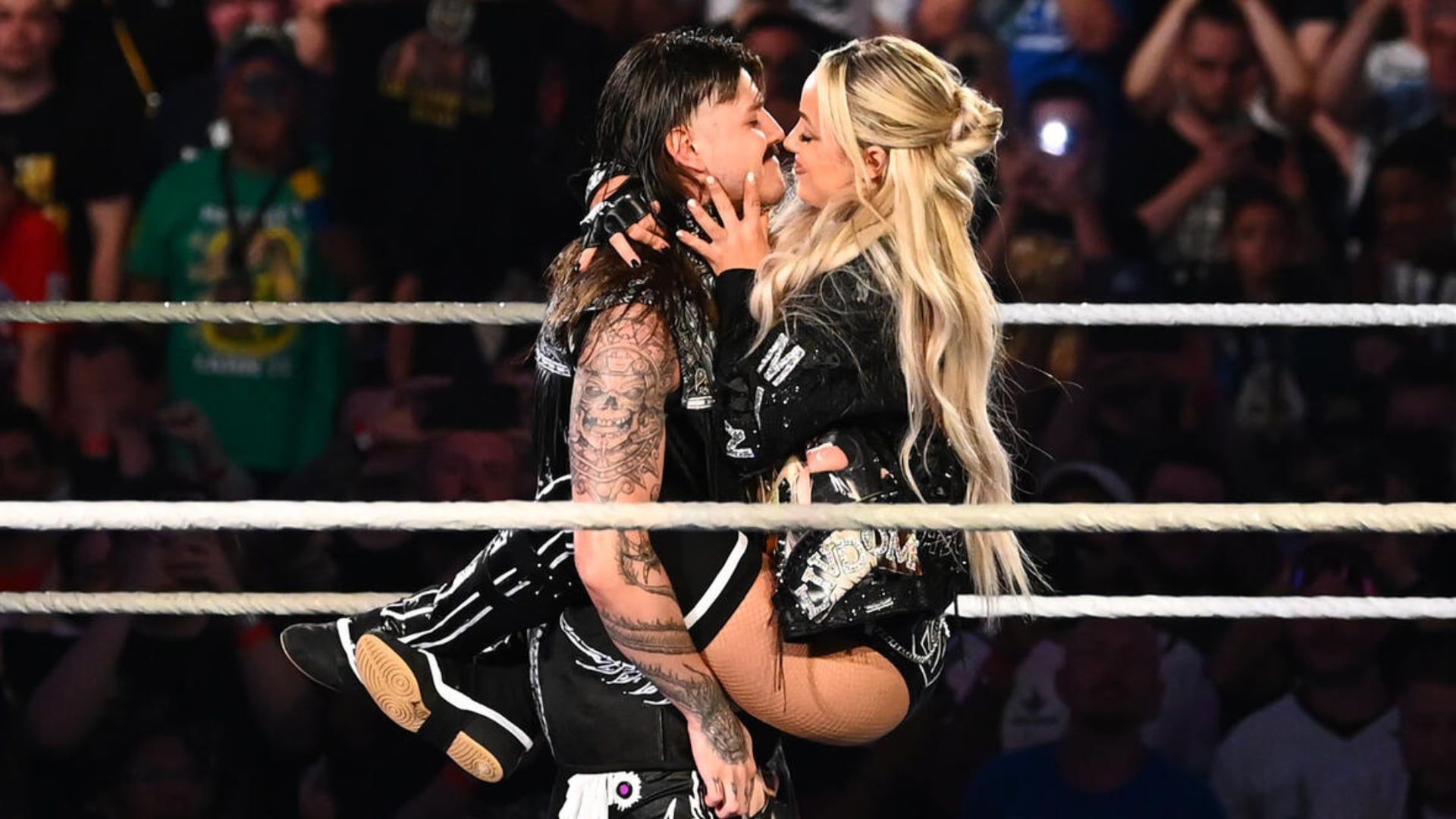 Liv Morgan and Dominik Mysterio celebrate [Image credits: WWE.com]