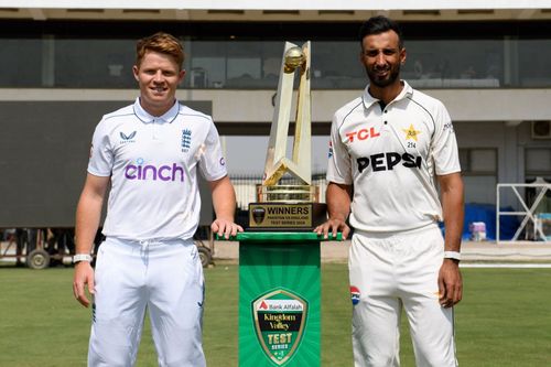 Shan Masood and Ollie Pope pose with the trophy. (Credits: PCB Twitter)