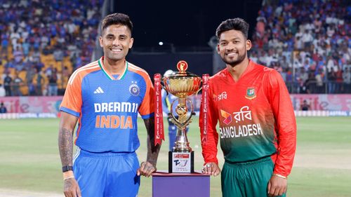 Captains Suryakumar Yadav (L) and Najmul Hossain Shanto (R) posing with the trophy (Image credits: BCCI)