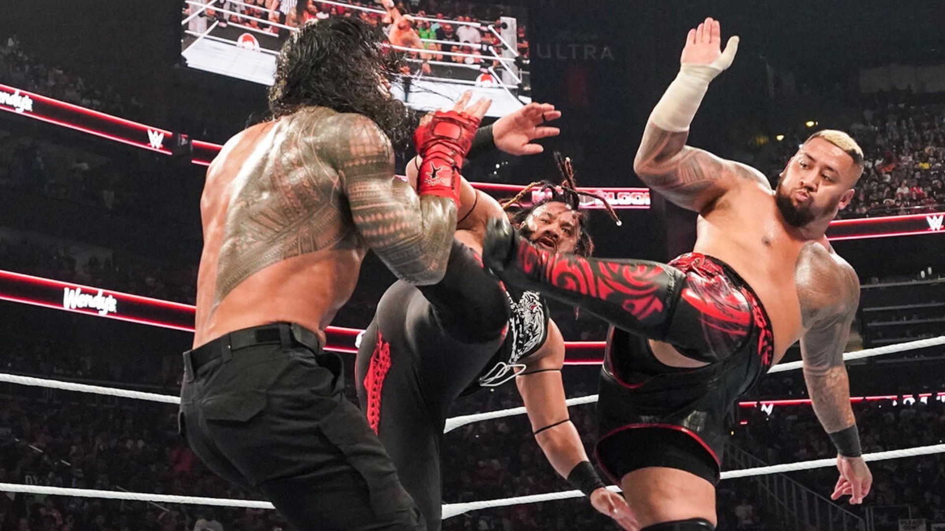 Solo Sikoa and Jacob Fatu attacking Roman Reigns at Bad Blood [Image via wwe.com]