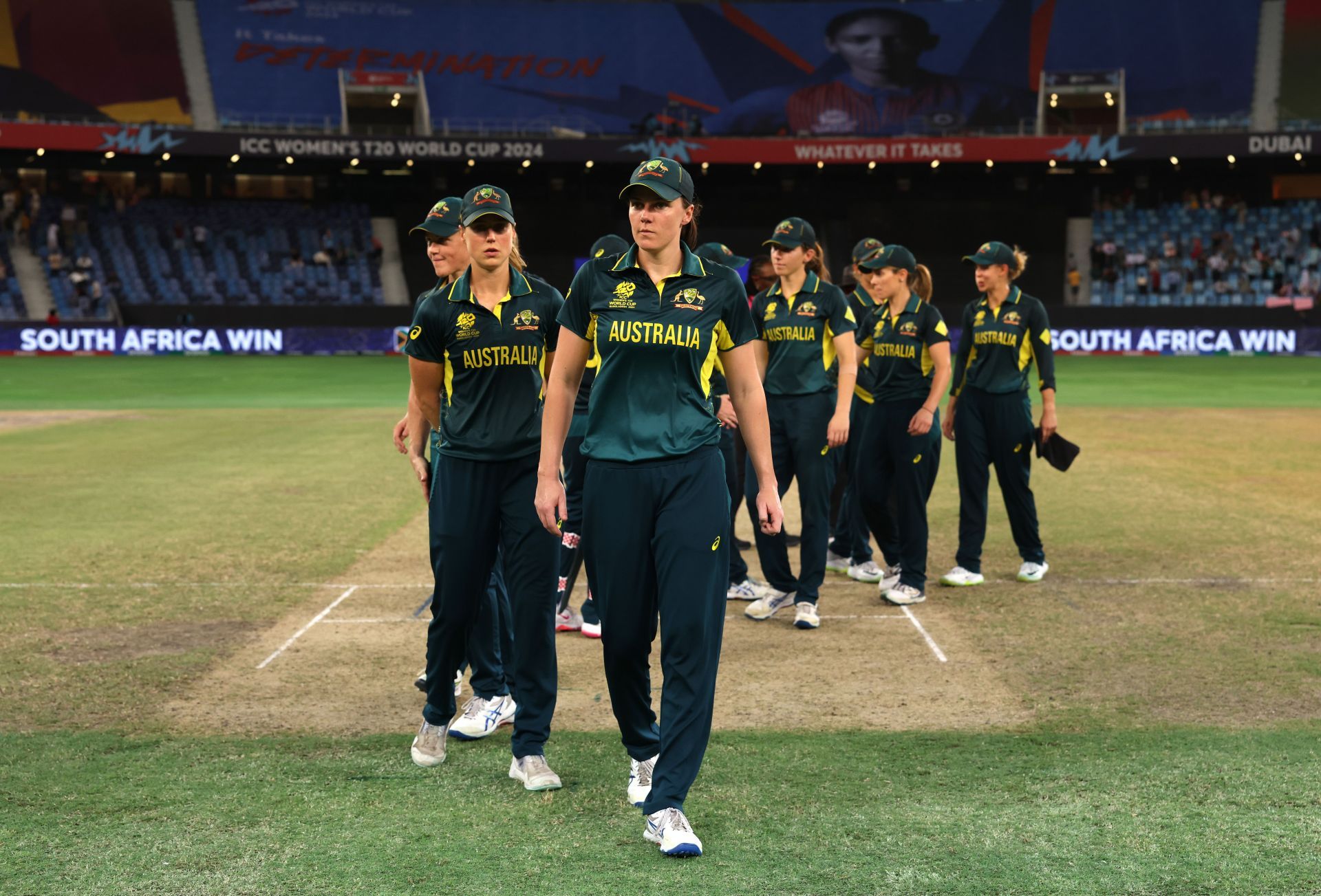 A dejected Australian side leaves the field after a heavy defeat against South Africa. Source: Getty