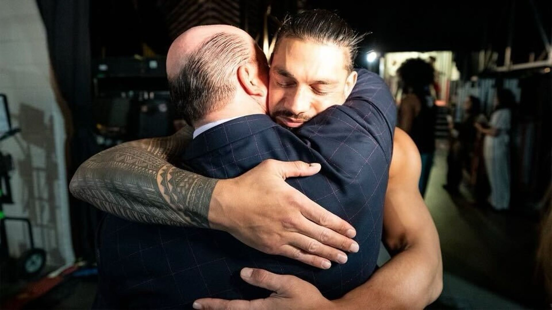 Roman Reigns and Paul Heyman backstage at WWE event