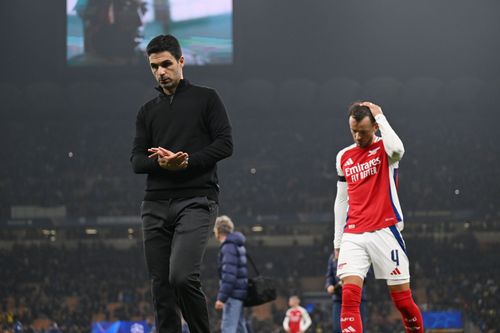 Gunners boss Mikel Arteta (left)