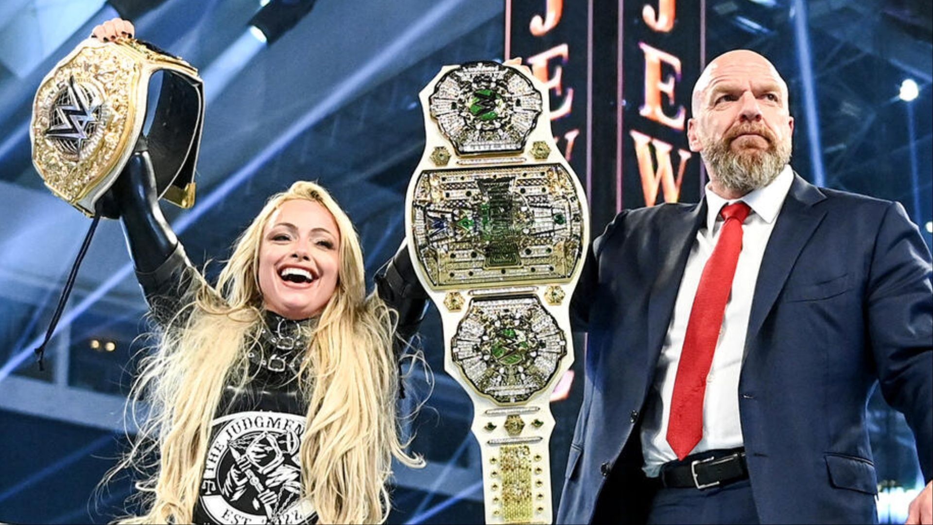 Liv Morgan and Triple H in a WWE ring. (Photo: WWE.com)