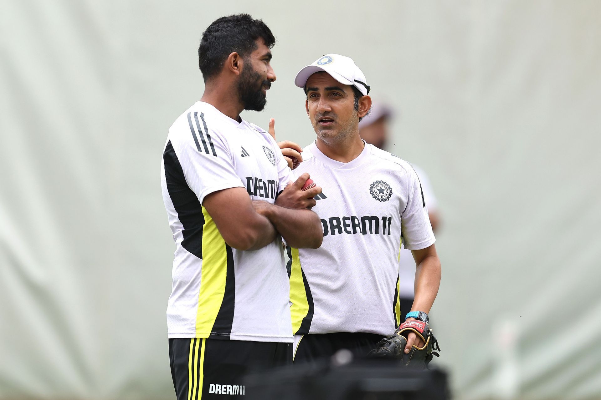 PERTH, AUSTRALIA - NOVEMBER 19: Jasprit Bumrah and Gautam Gambhir, head coach of India talk during an India Test Squad training session at Optus Stadium on November 19, 2024 in Perth, Australia. (Photo by Paul Kane/Getty Images) - Source: Getty