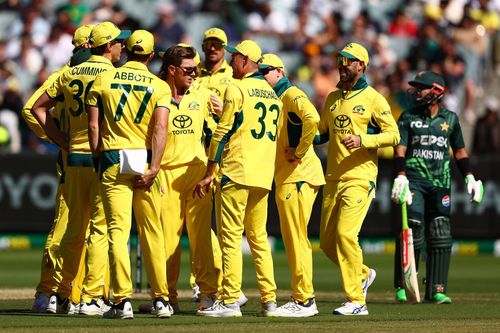 Australia celebrates the wicket of Babar Azam with Mohammad Rizwan watching in the background (File image via Getty)