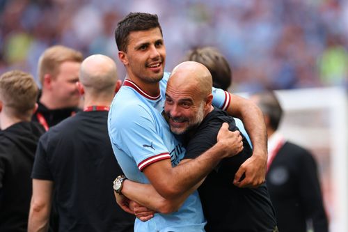 Rodri and Pep Guardiola celebrate (Image - Getty)