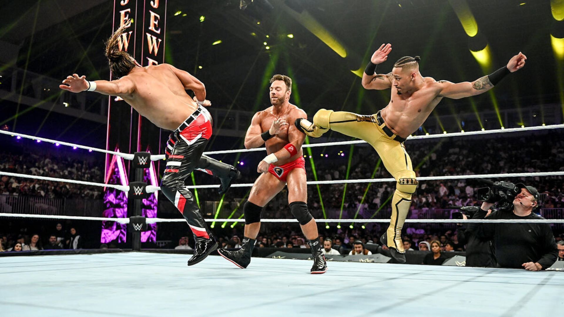 LA Knight fought off a stout challenge from two hungry opponents. (Image Credit: WWE.com)