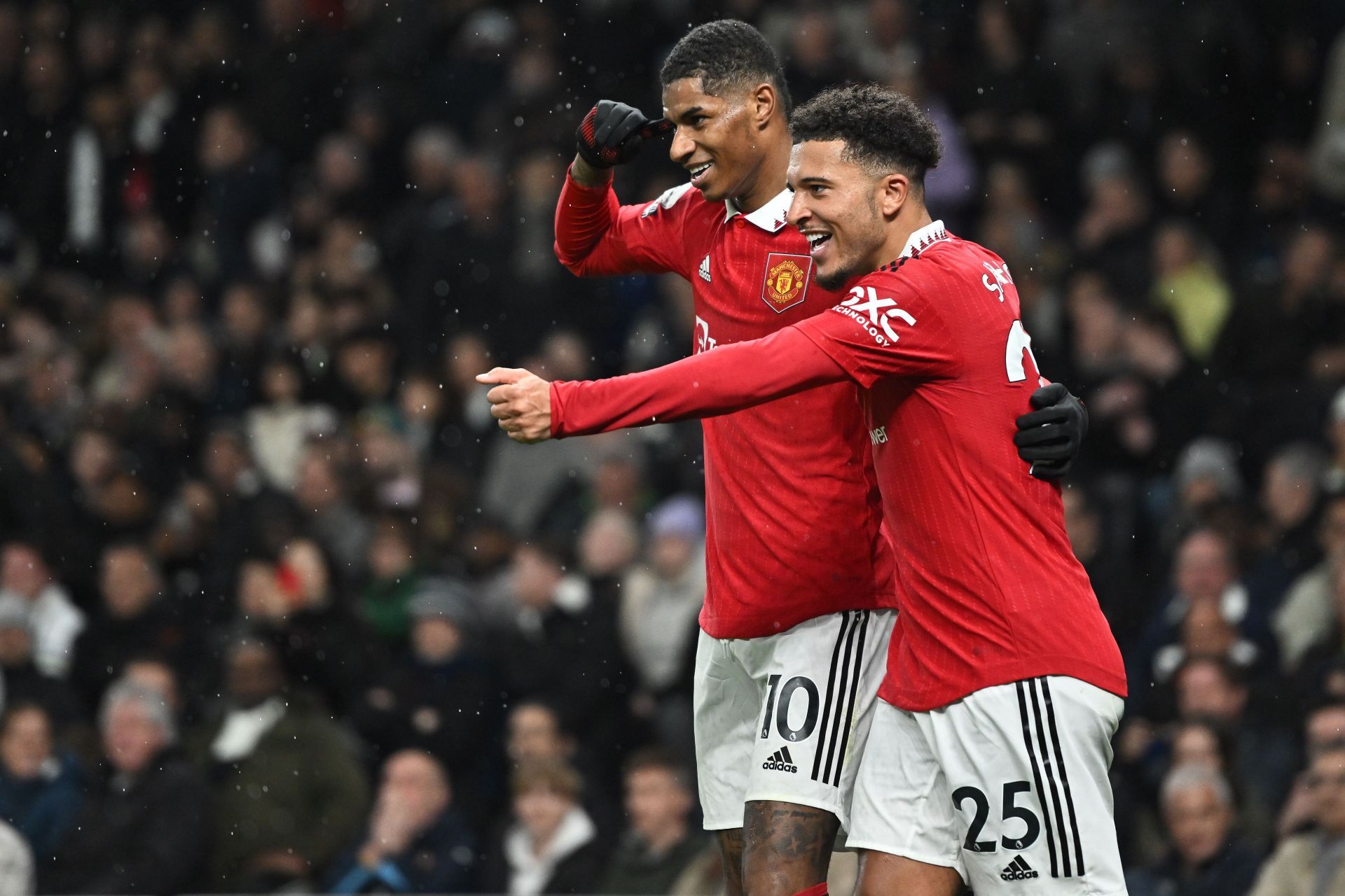 Ex-Manchester United teammates Marcus Rashford and Jadon Sancho celebrate together (Image - Getty)