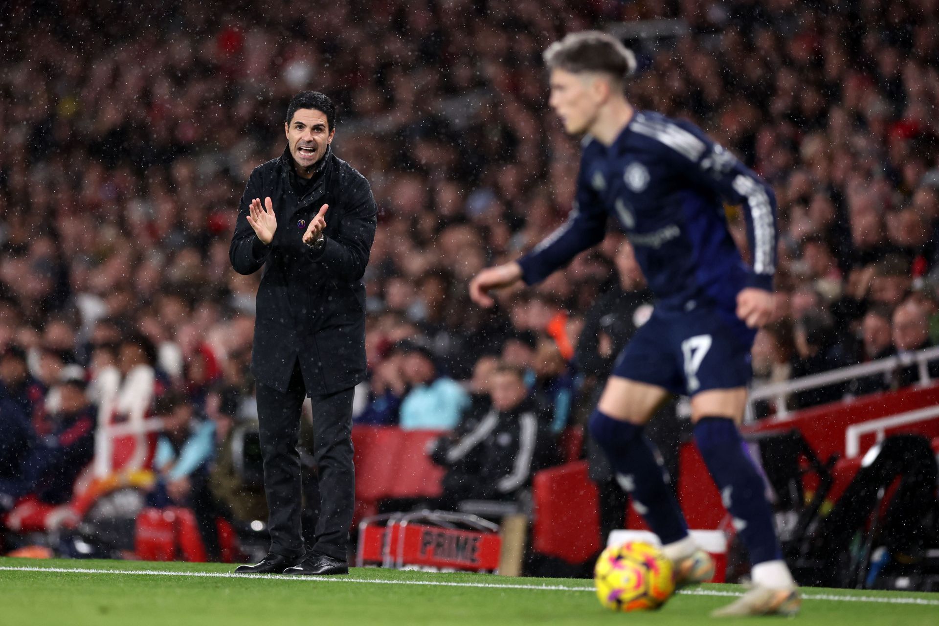 Arsenal boss Mikel Arteta (left)