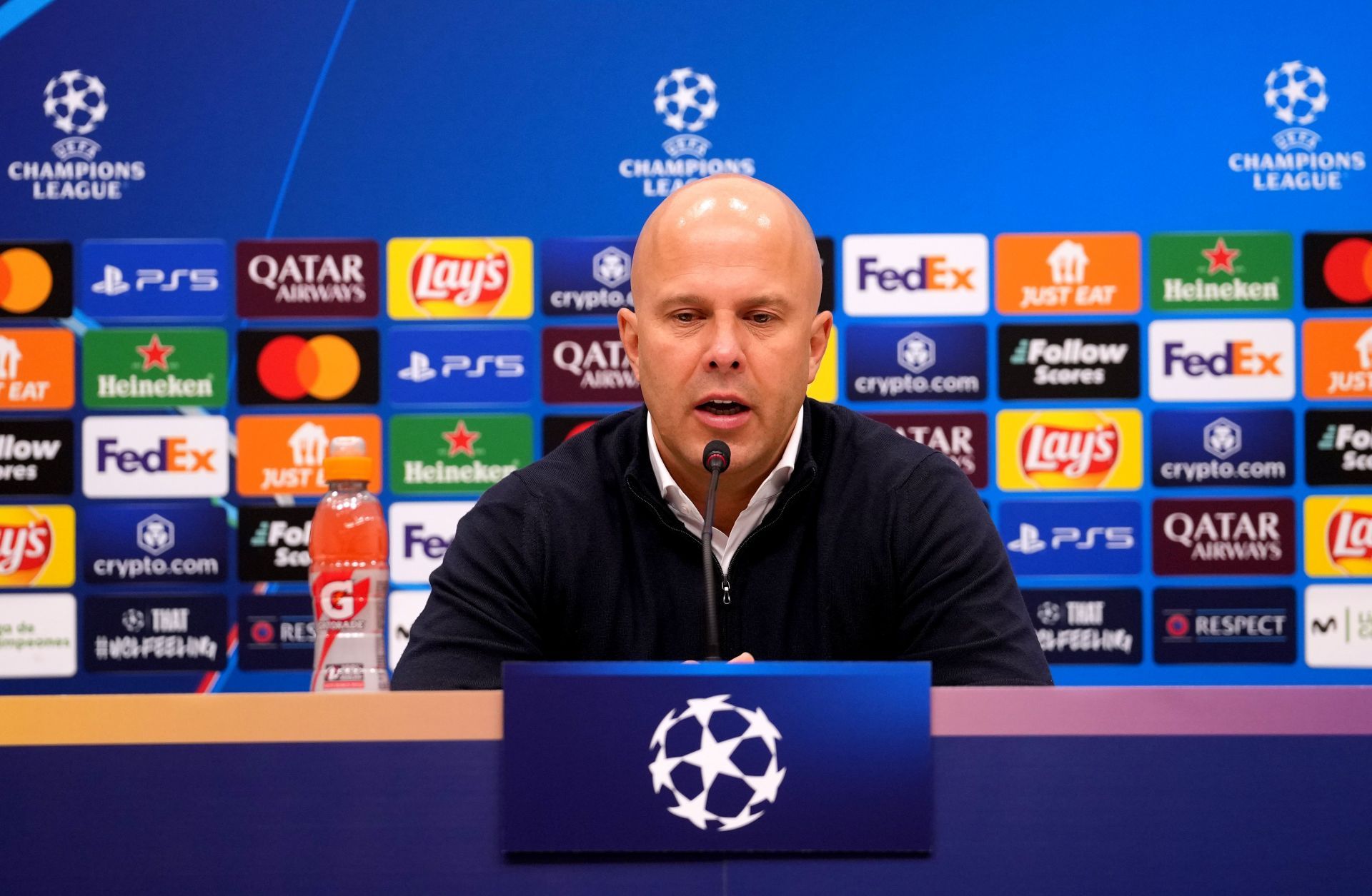 Liverpool boss Arne Slot looks on during a press conference