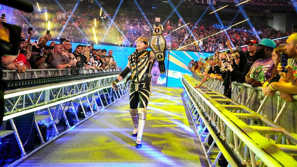 Logan Paul poses with the WWE United States Championship (Image via WWE.com).