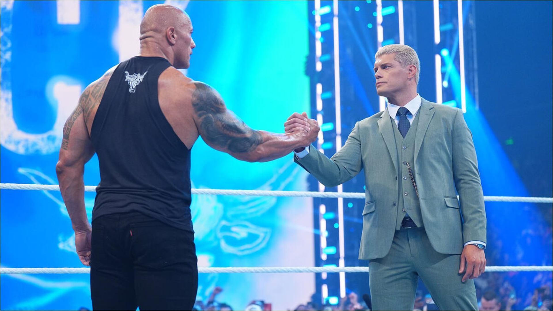 The Rock and Cody Rhodes shake hands on the February 2, 2024 episode of SmackDown [Image from WWE.com]