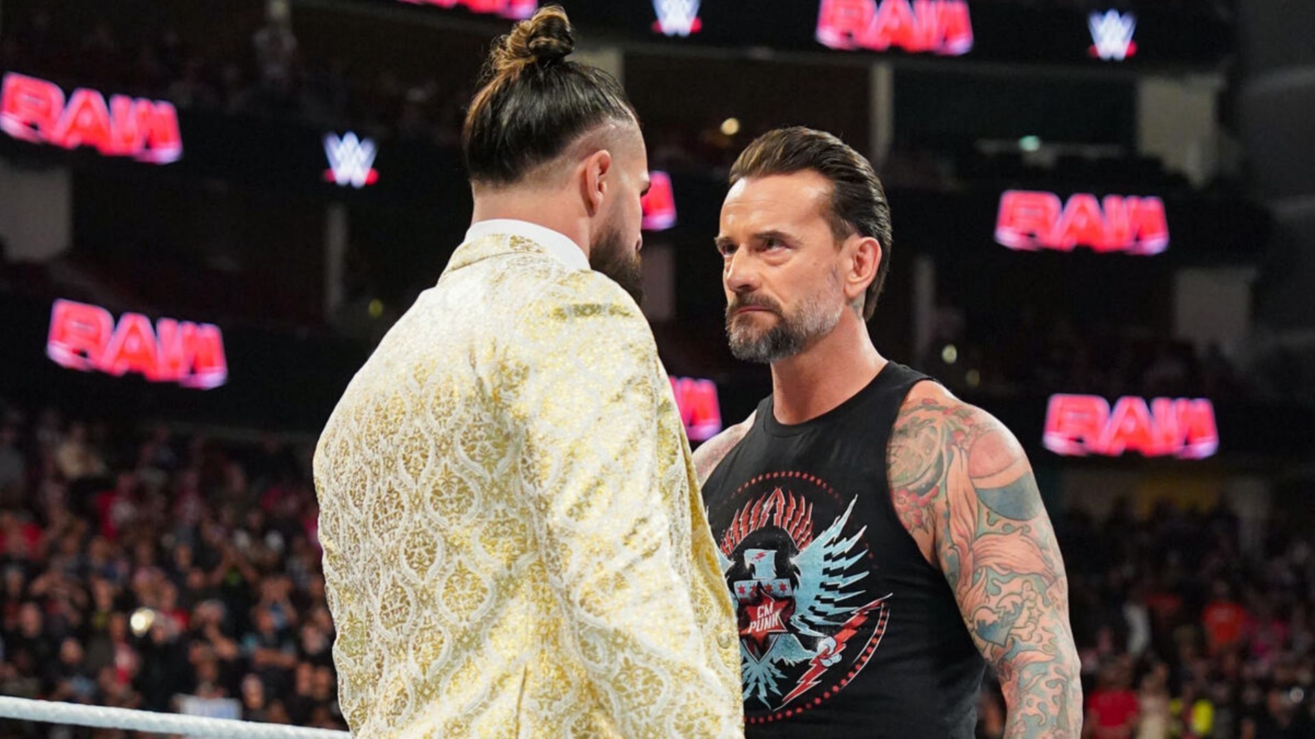 CM Punk and Seth Rollins face-to-face (Image credit: WWE.com)