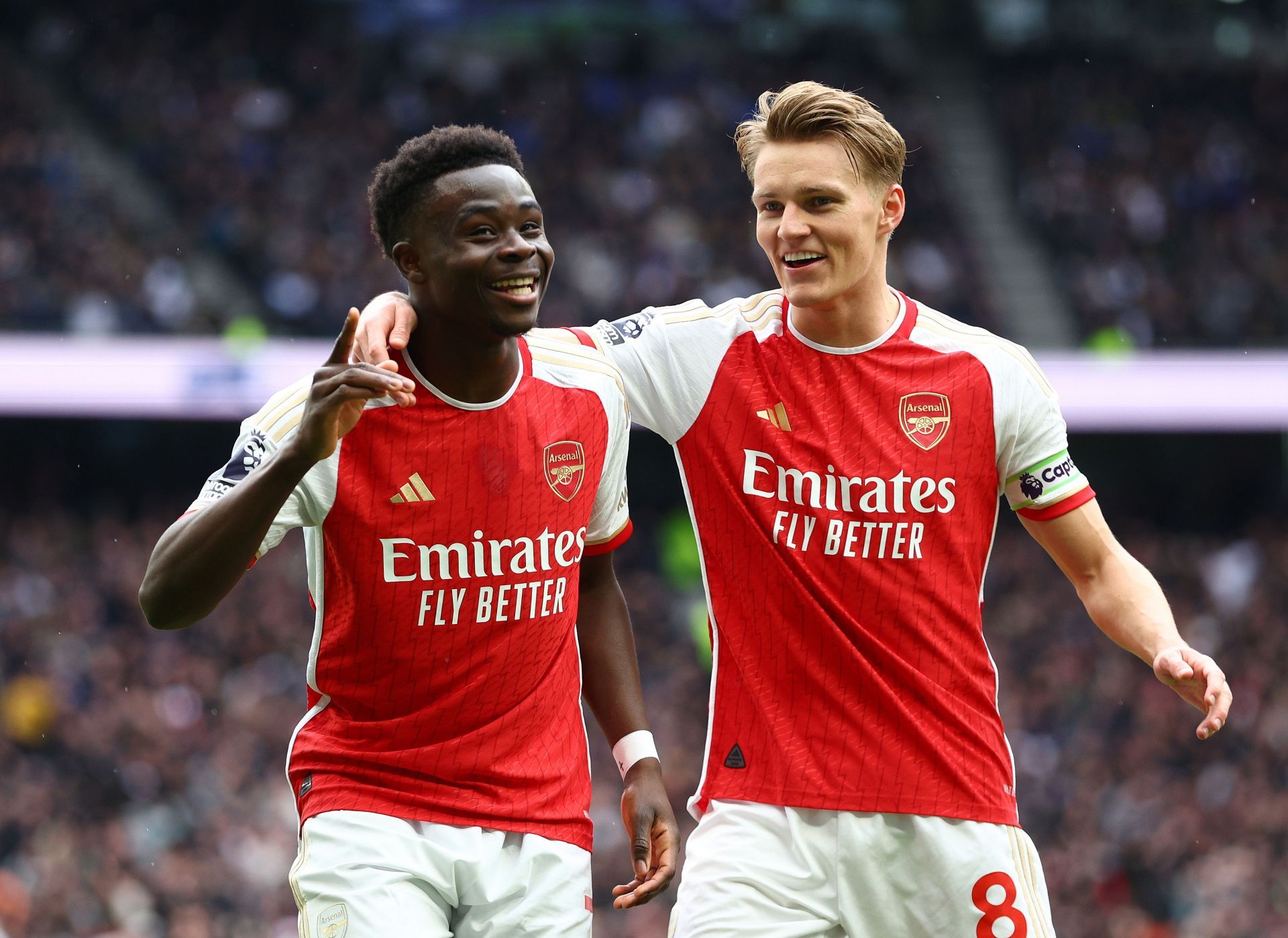 Bukayo Saka (left) and Martin Odegaard