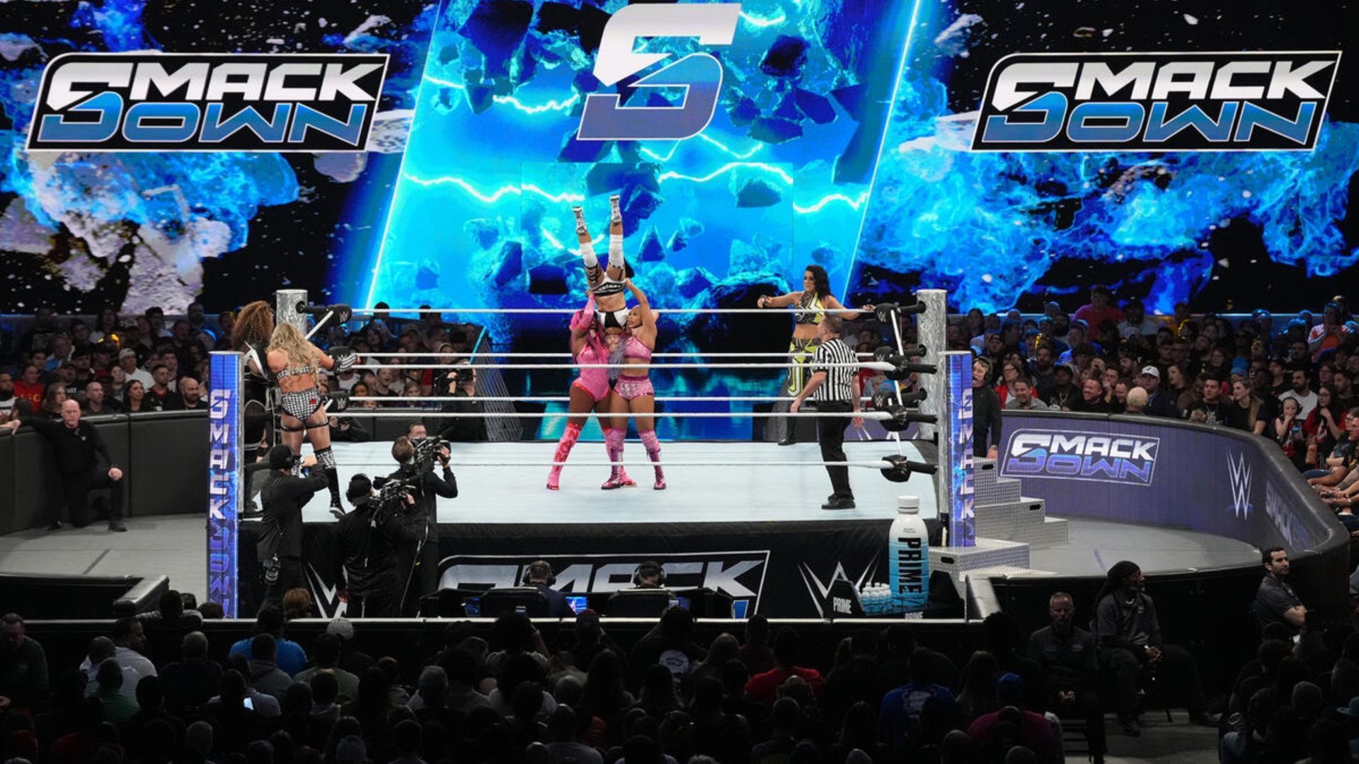 Six-woman tag team action as seen on WWE SmackDown (Image via WWE.com)